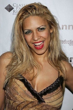 Dita de Leon as Newsroom Pornstar in Stonerville
