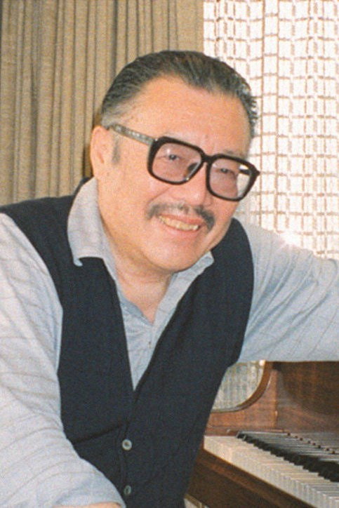 岡村喬生 as Danto in A Quiet Life