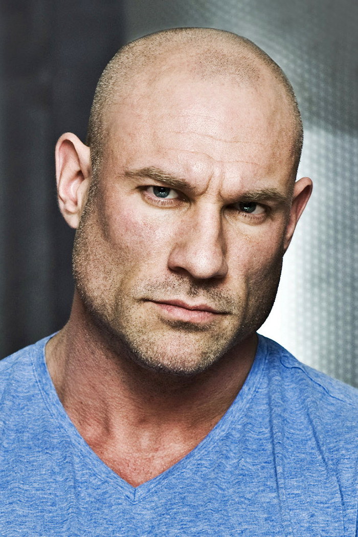 Nicolas Grimes as Captain Commander in Midnight Marathon