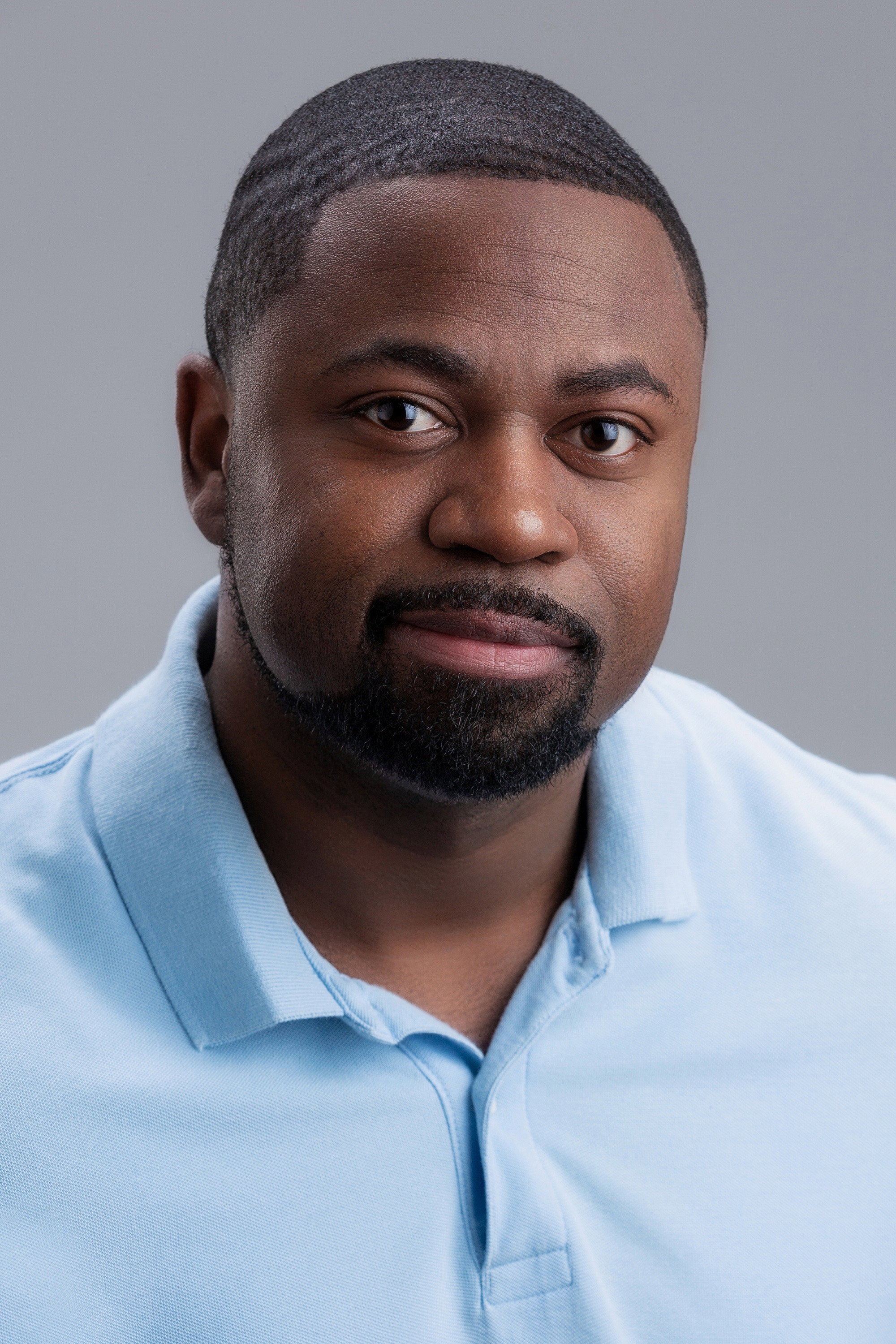 LeJon Woods as Father McGavin in Baby Oopsie 3: Burn Baby Burn