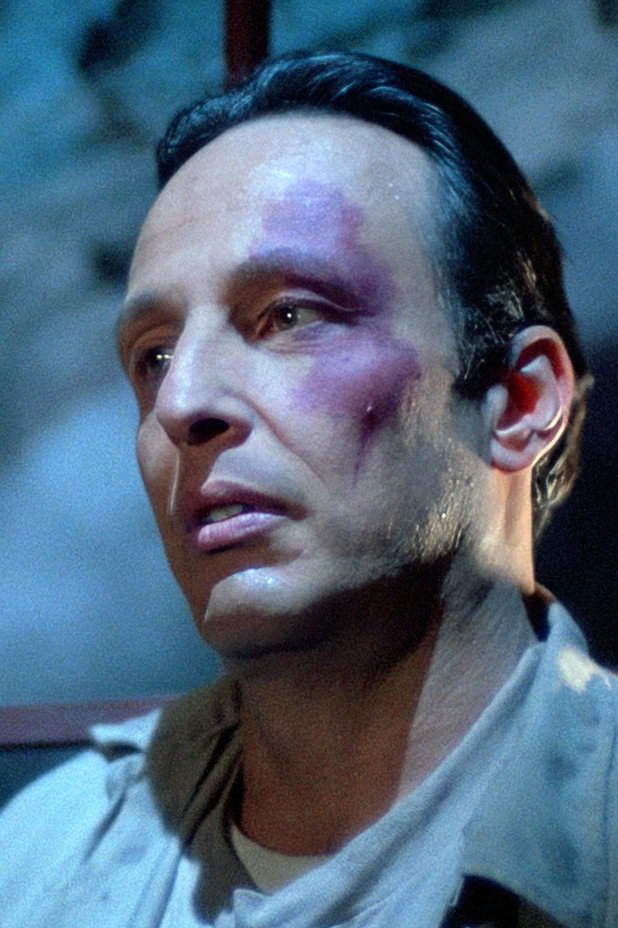 Alex Kubik as Graham in Dark Canvas