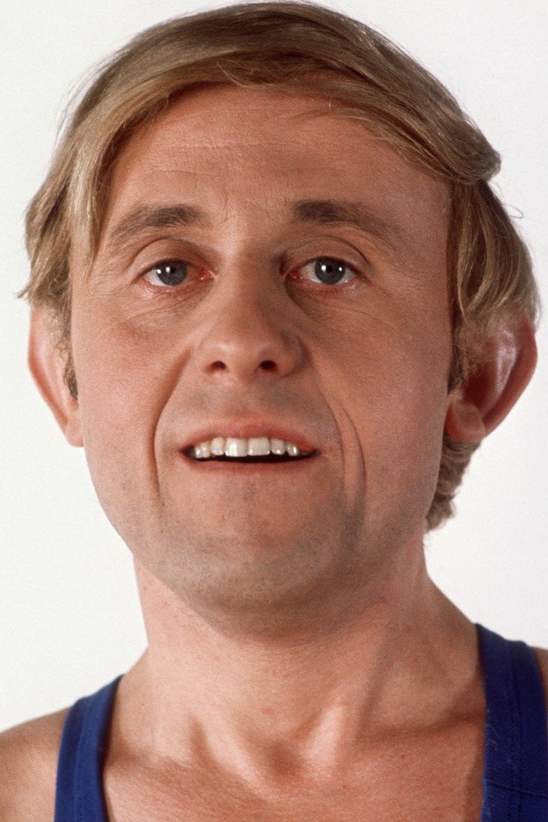 Christian Marin as Albert Merlot in Le Gendarme à New-York
