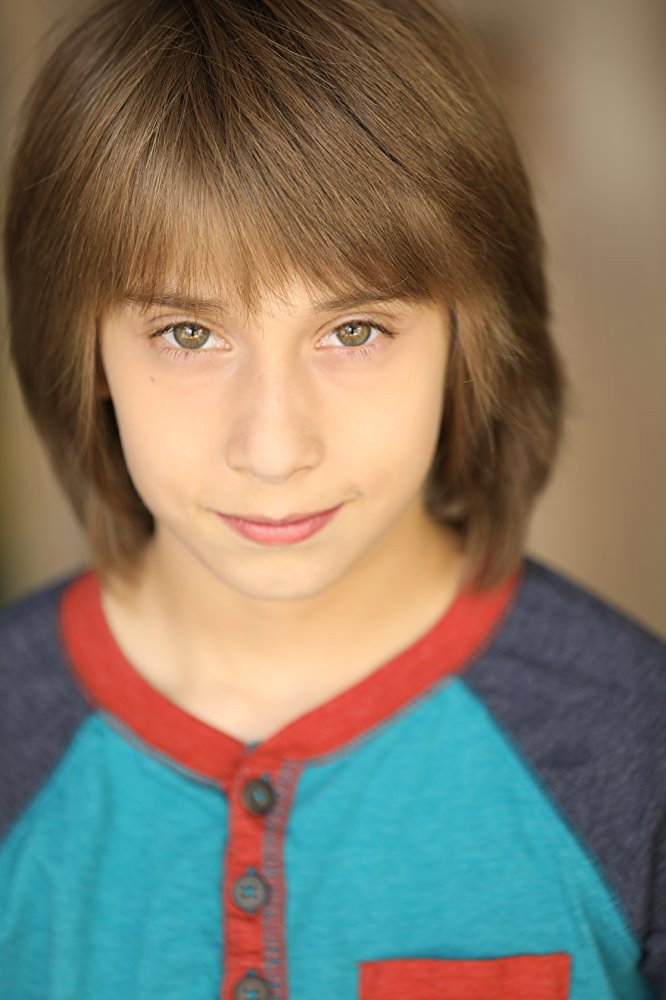 Jake T. Getman as Caleb (voice) in Elio