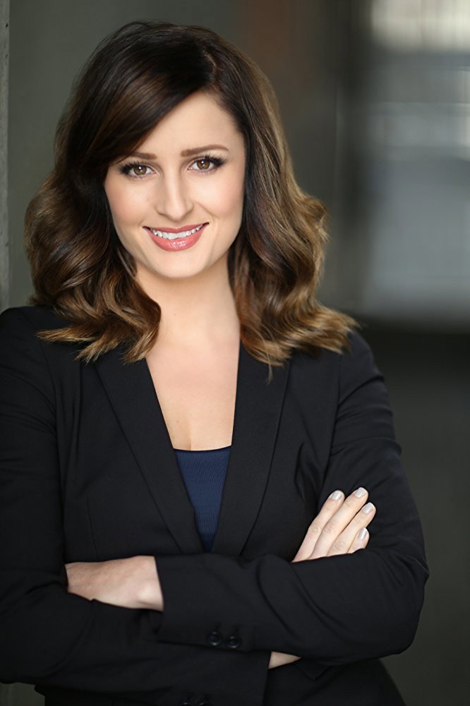 Allison Riley as Carol in Corner Office