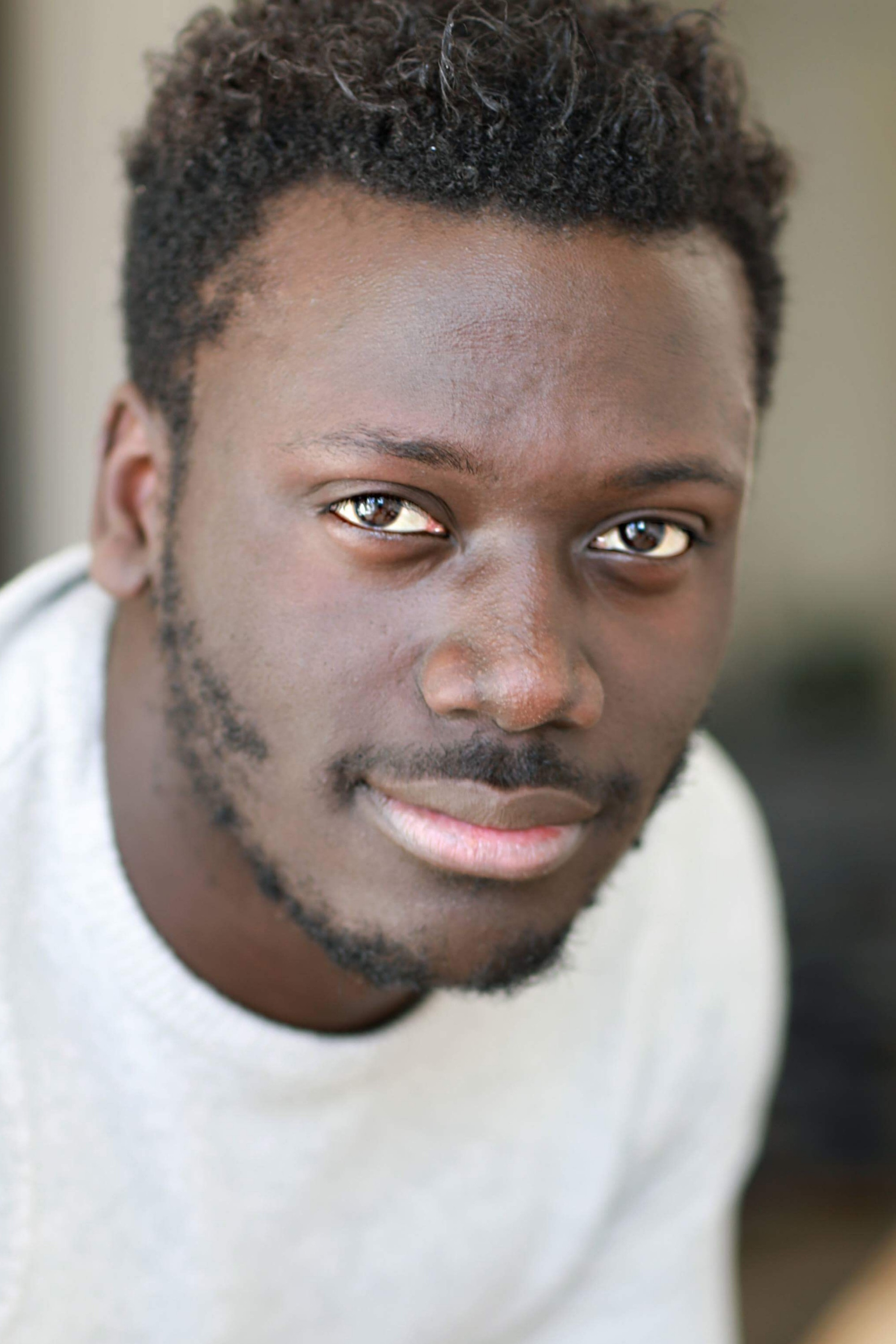 Souleymane Touré as Épicier in Revoir Paris