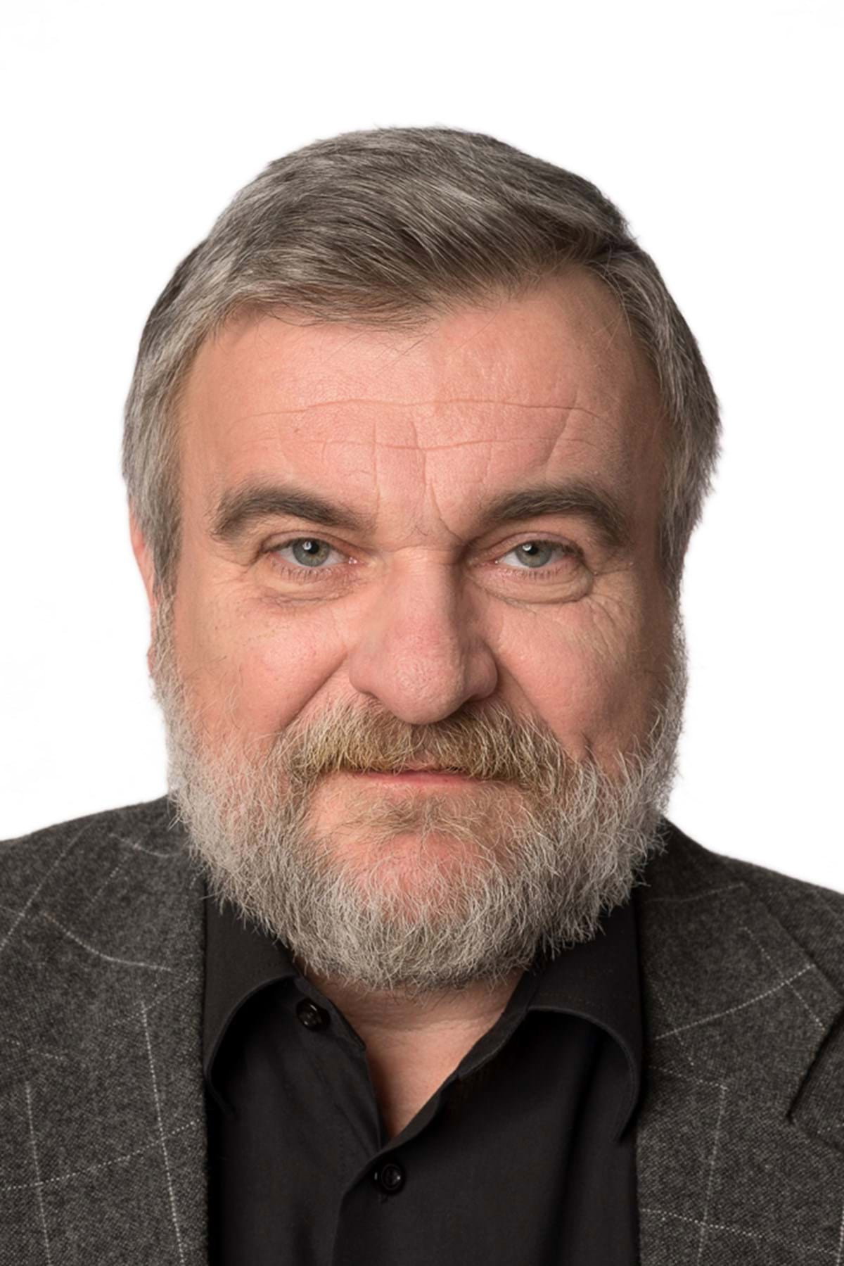 Krzysztof Dzierma as priest Antoni in In Heaven As It Is on Earth