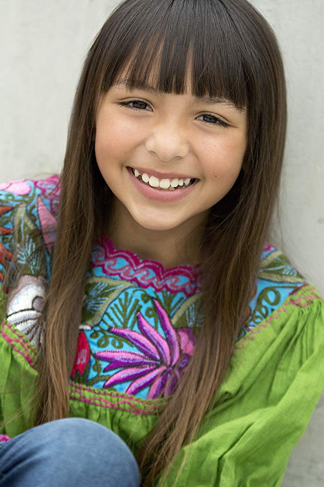 Allie Urrutia as Girl 1 in The Gun