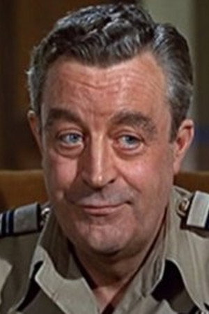John Barrie as Supt. Sloane in The File of the Golden Goose