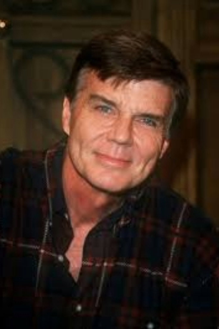 John Davidson as Host in Time Machine