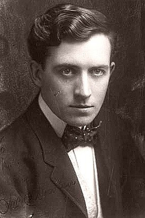 William C. Dowlan as Larry Moore in Across the Footlights