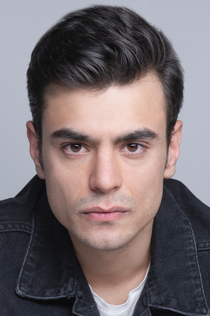 Semi Sırtıkkızıl as Emrah in The Agency