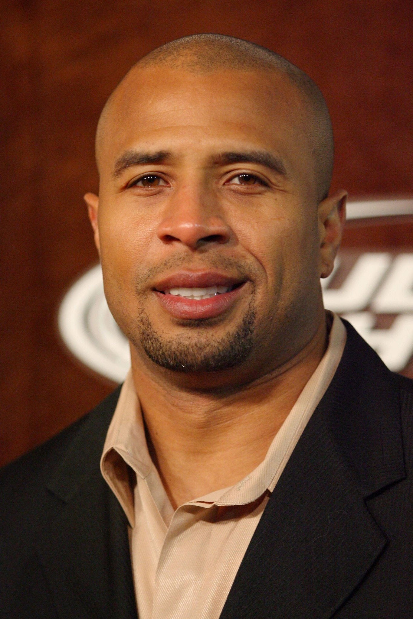 Dorsey Levens as Coach James in Gridiron UK