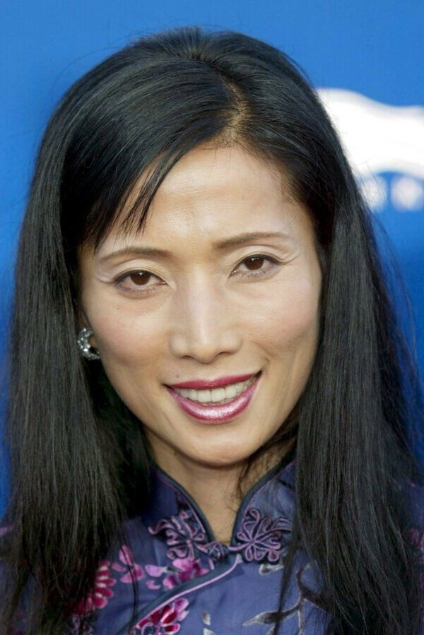 西脇美智子 as Miss Nishiwaki in Angel Terminators