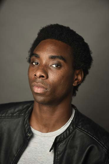 King Davies Dogbe as Micah in Black Krampus