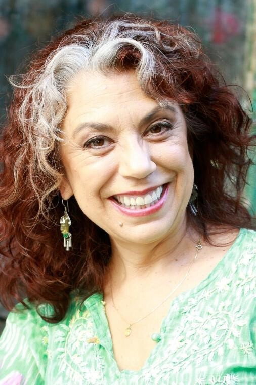 Rose Portillo as Millie Zamora in Eisenhower and Lutz