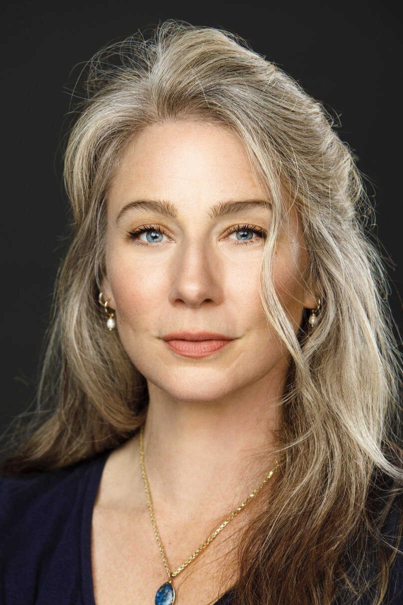 Lynn Collins as Suicide Blonde / Mrs. Dobkins / Young Fingerling's Mother in The Number 23