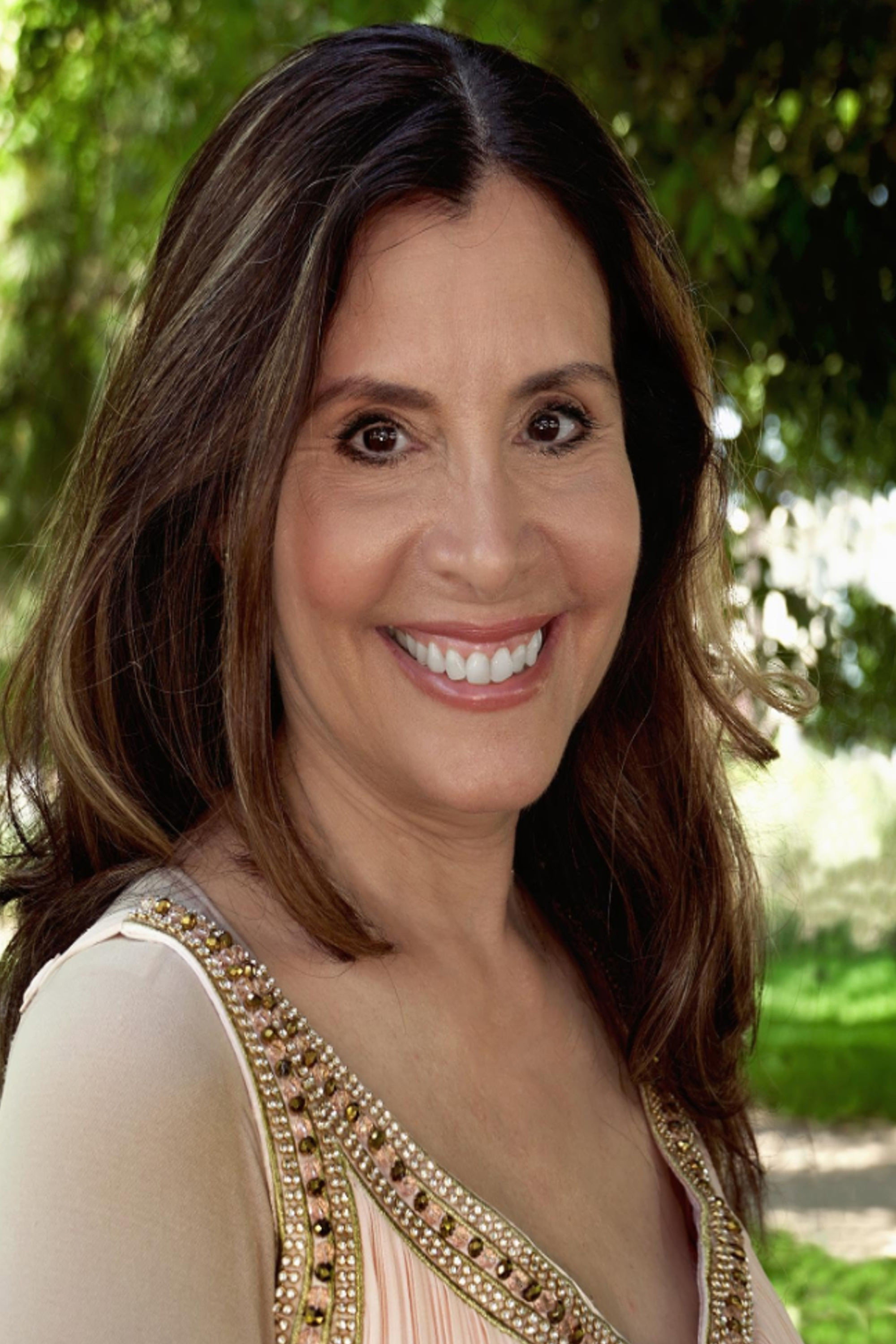Jackie Torres as Laz's Mother in Blood Stains