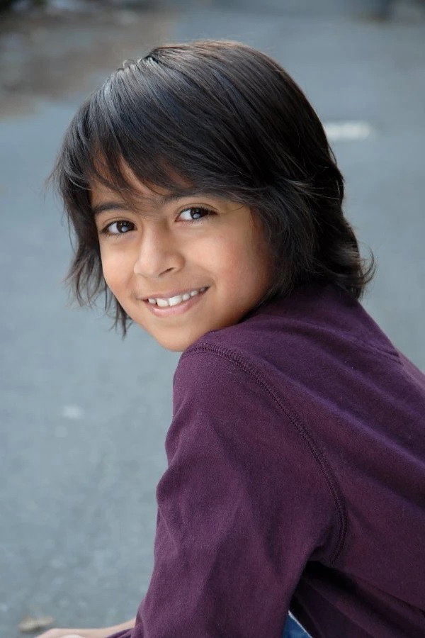 Qayam Devji as Laughing Punk in Splitting Adam