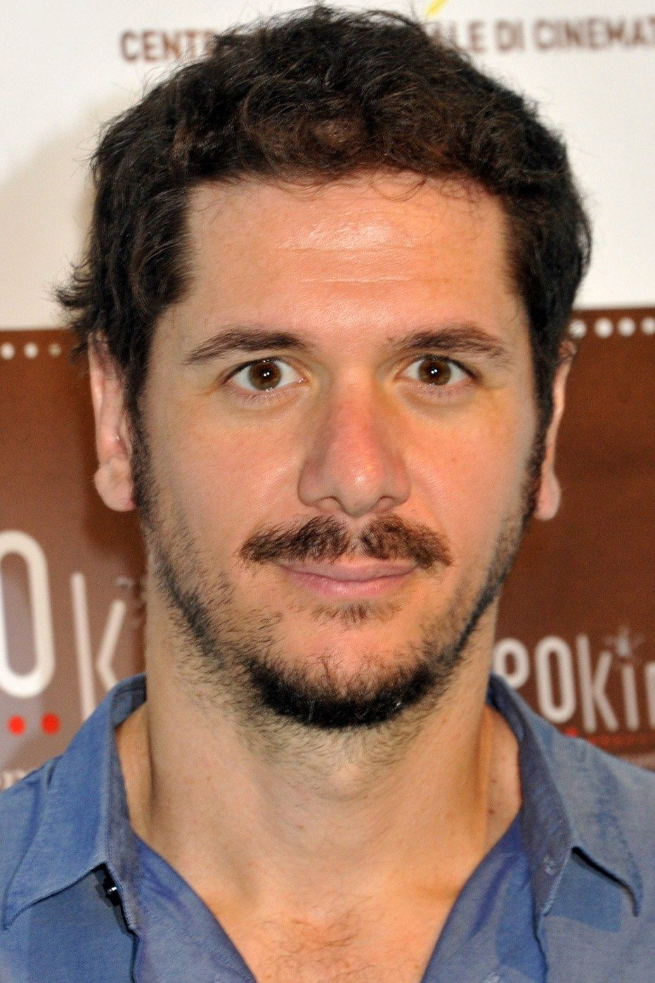 Gabriele Mainetti as Marco in Il cielo in una stanza