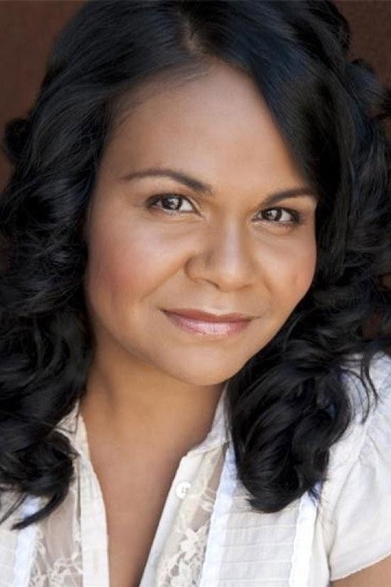 Ursula Yovich as Chrissie in Around the Block