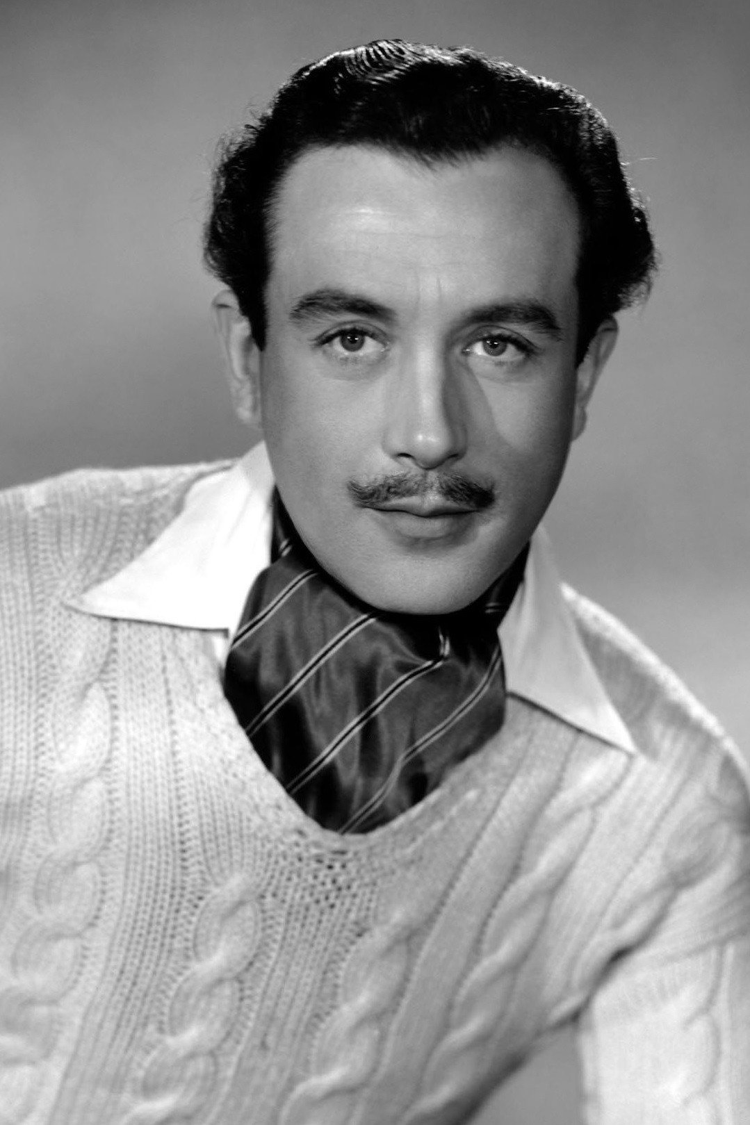 Dennis Price as Jeeves in The World of Wooster