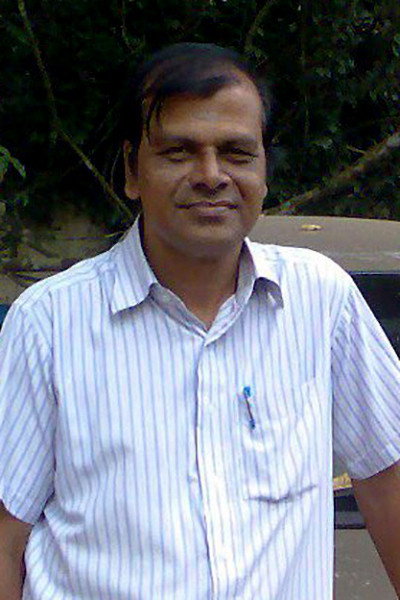 Poojappura Radhakrishnan as Rajappan Nair in Namukku Parkkan Munthiri Thoppukal
