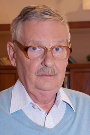 Juraj Slezáček as Prof. Emil Blichar in Panelák