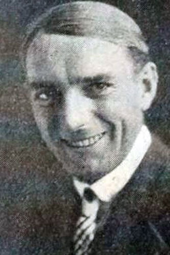 Charles West as The Chief of Police's Son (as an adult) in Waiter No. 5