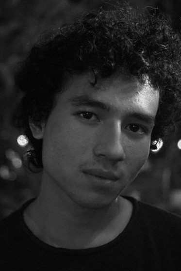 Giulio Parengkuan as Hasbi in The Queen of Black Magic