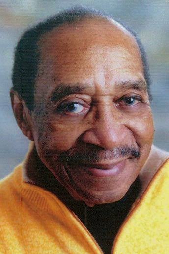 Herb Lovelle as Ken Malik in Mitchellville