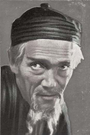 Georg John as Dr. Perennius Bell in The Boy in Blue