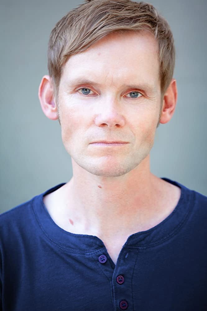 John Lee Ames as Trent in Days of Darkness