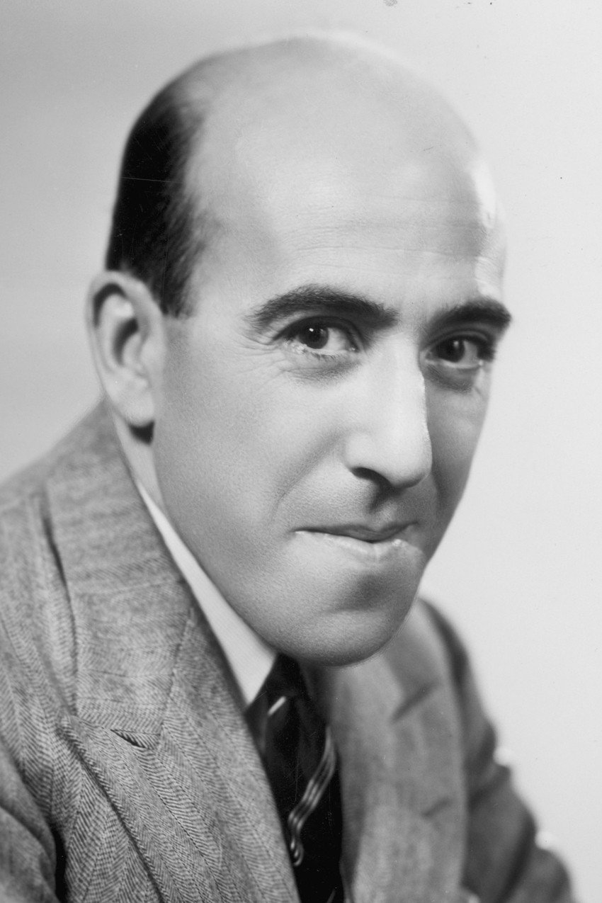 Robertson Hare as The Archdeacon, The Venerable Henry Blunt in All Gas and Gaiters