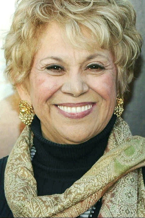 Lupe Ontiveros as Momma Cecilia in Our Family Wedding