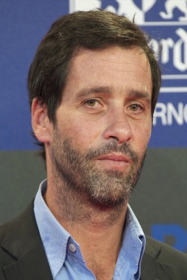 Juan Pablo Shuk as Augusto Lora in No Rest for the Wicked