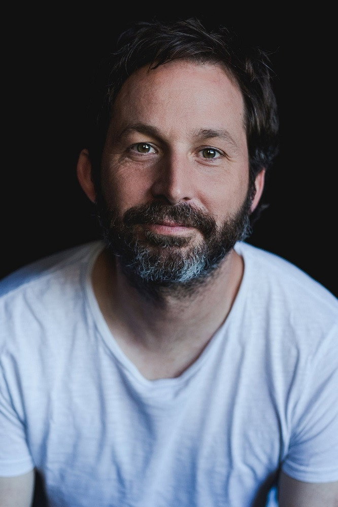 Dave Lawson as Scott Byrnes in Utopia