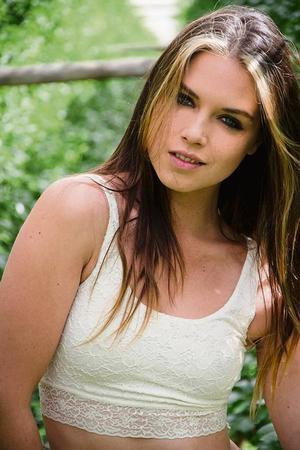 Christia Visser as Caroline Munro in Planet of the Sharks