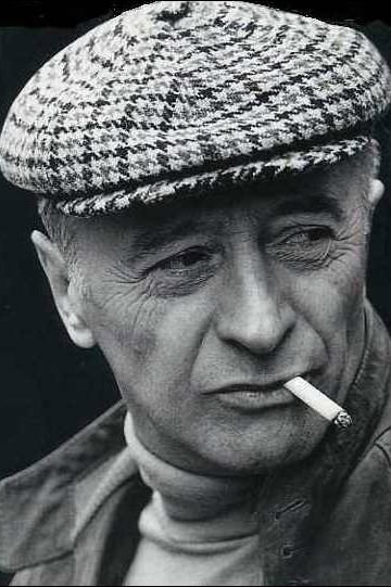 Michel Audiard as Self (archive footage) in Belmondo, il était une fois le beau monde