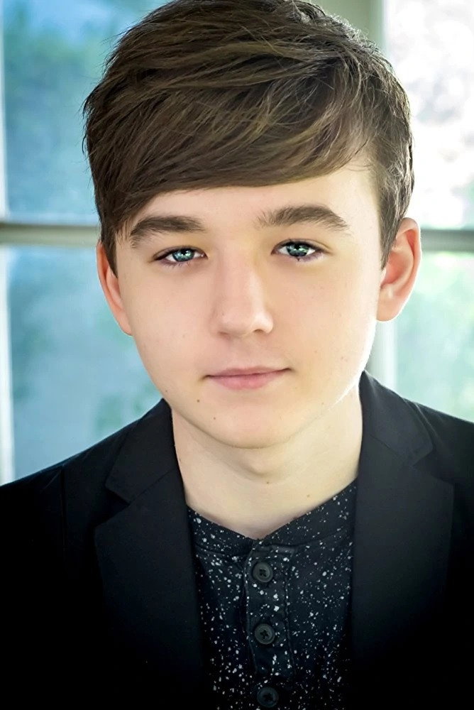 Benjamin Stockham as Robby Gunderson in Sons of Tucson