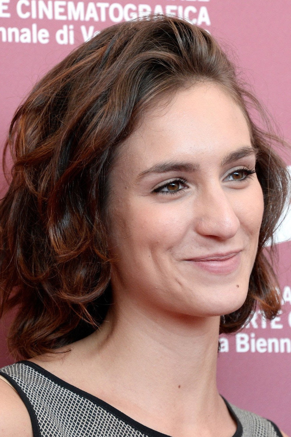 Livia Rossi as Nadia's sister in The Girl Has Flown
