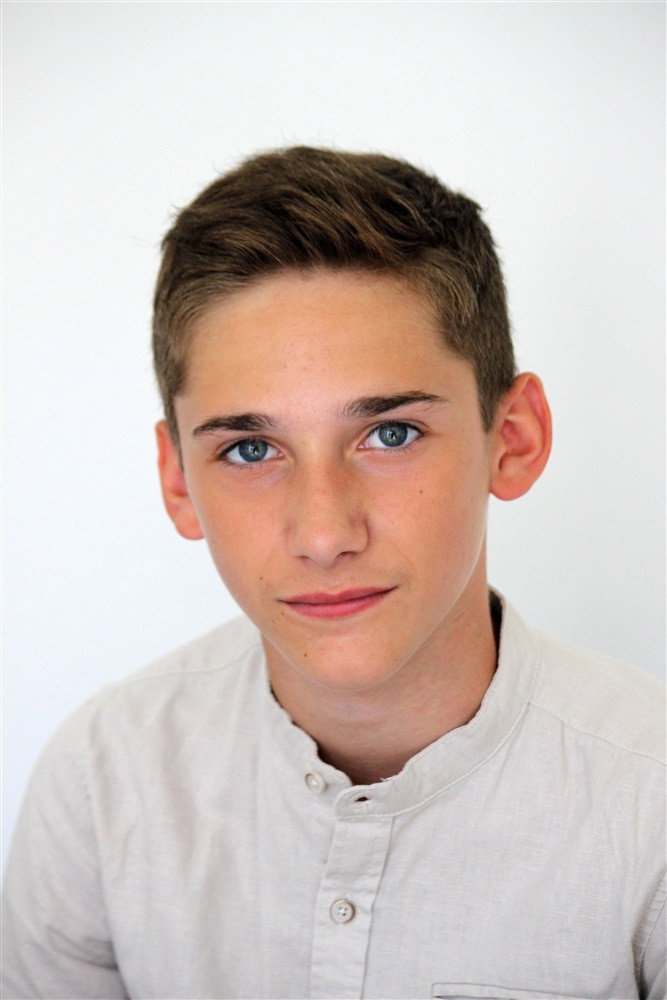 Alex Terrier-Thiebaux as Simon in Chicken