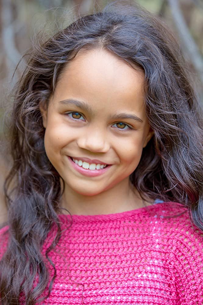 Chloe De Los Santos as Maggie in Woody Woodpecker Goes to Camp