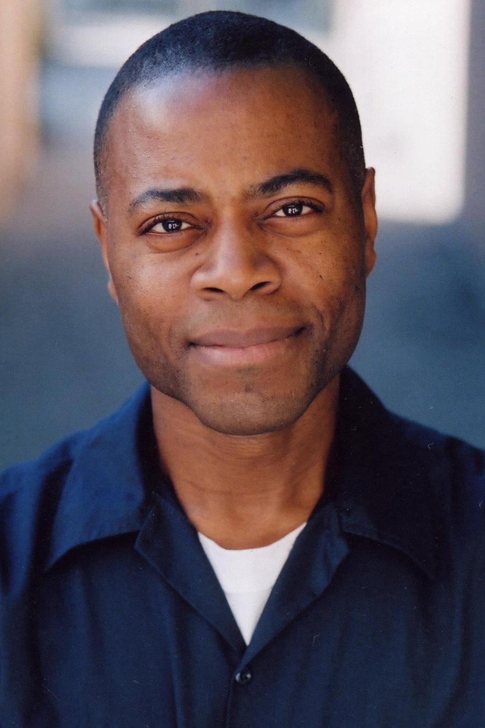 Terry Woodberry as Chairman Pleasance in Asteroid-a-Geddon