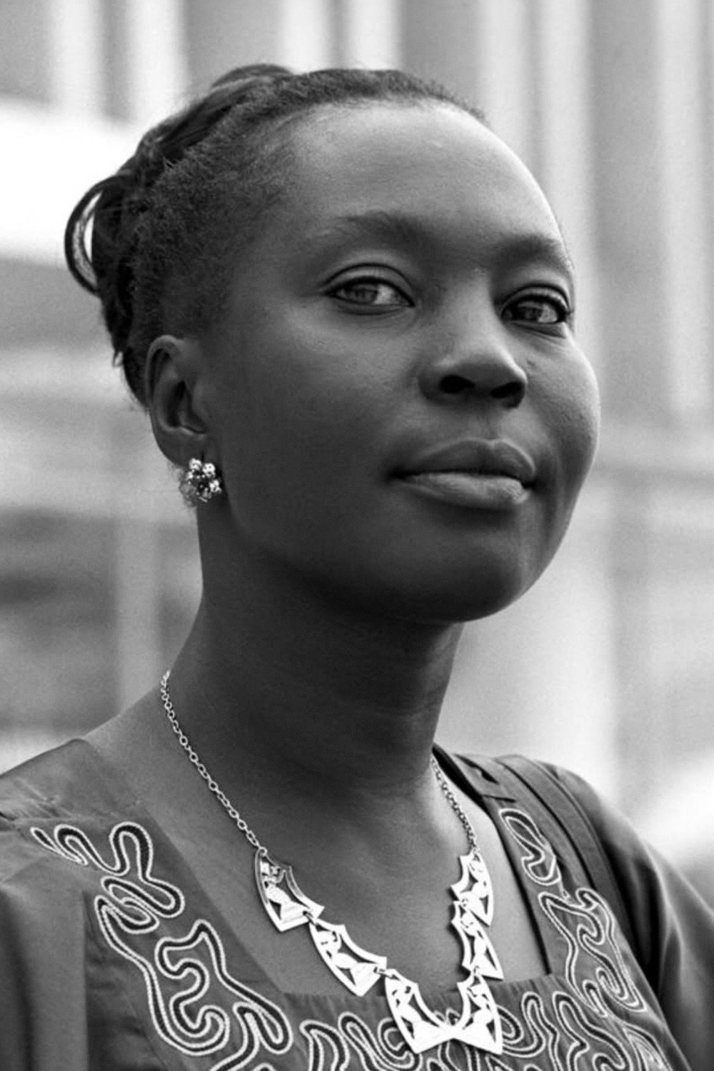 Mbissine Thérèse Diop as Mrs. Moussombe in Black Sun