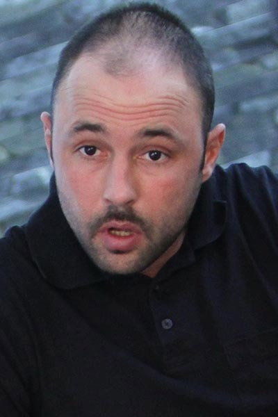 Greg Centauro as Guest at the party in So Long Mister Monore
