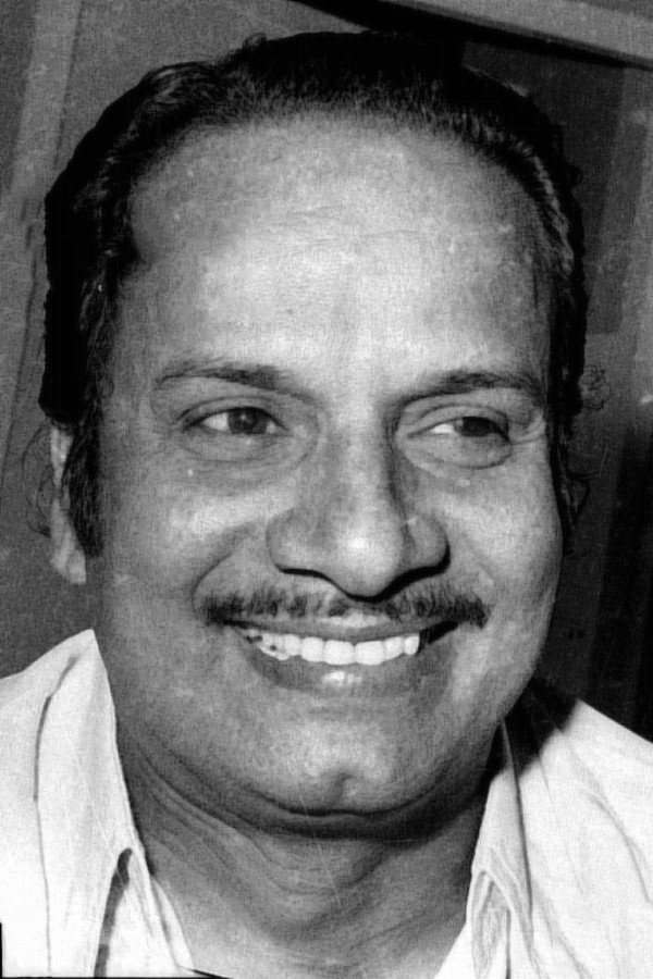 Nellikode Bhaskaran as Raman Nair in Pallamkuzhi