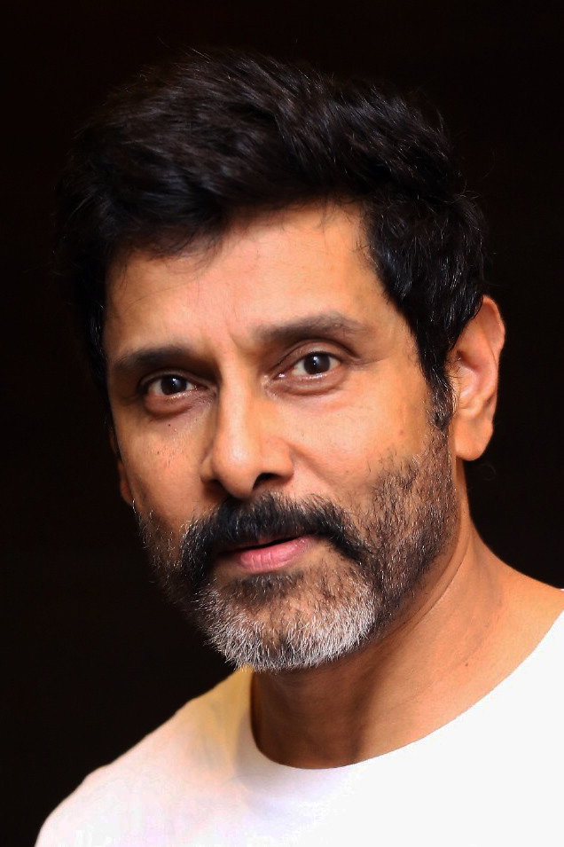 Vikram as John /  Dhruv / K in Dhruva Natchathiram: Chapter One – Yuddha Kaandam