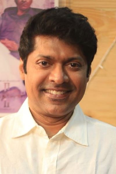Magizh Thirumeni as Dr. Varadarajan in Teddy