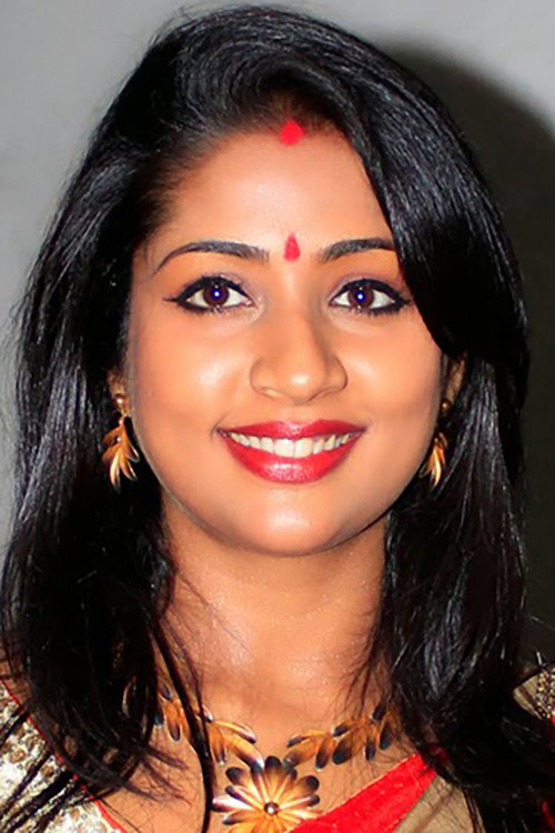 Navya Nair as Radhamani in Oruthee