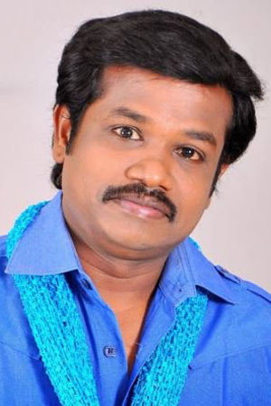 Madurai Muthu as Bhaskar 'Boskey' in Happy Raj